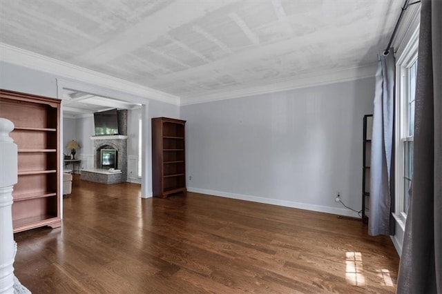 15320 W 92nd Pl, Lenexa, KS 66219 - unfurnished living room featuring a fireplace, wood finished floors, and ornamental molding