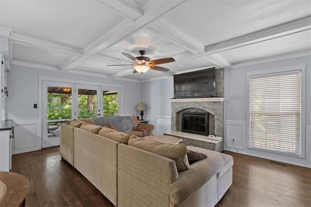 15320 W 92nd Pl, Lenexa, KS 66219 - living room featuring dark wood finished floors, coffered ceiling, beam ceiling, a ceiling fan, and a decorative wall