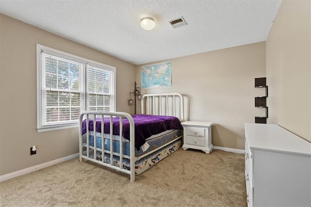 15320 W 92nd Pl, Lenexa, KS 66219 - carpeted bedroom with a textured ceiling and baseboards