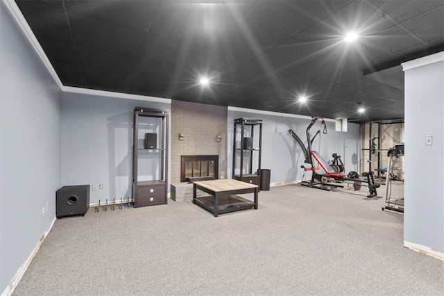 15320 W 92nd Pl, Lenexa, KS 66219 - exercise room featuring carpet floors, a brick fireplace, ornamental molding, and recessed lighting