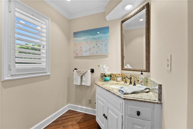 5212 W 98th Ter, Overland Park, KS 66207 - bathroom with vanity, wood finished floors, and crown molding