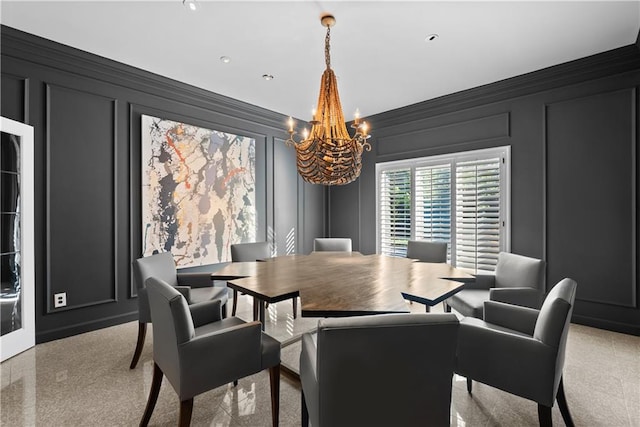 5212 W 98th Ter, Overland Park, KS 66207 - dining space with a decorative wall, crown molding, a chandelier, and light carpet