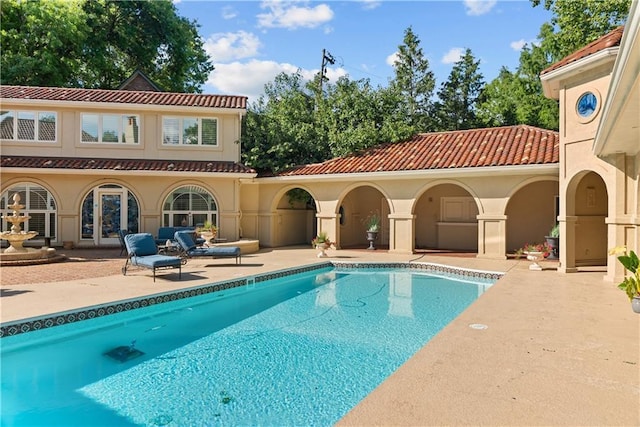 5212 W 98th Ter, Overland Park, KS 66207 - swimming pool featuring french doors and a patio