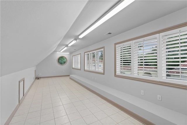 5212 W 98th Ter, Overland Park, KS 66207 - bonus room featuring vaulted ceiling and light tile patterned flooring