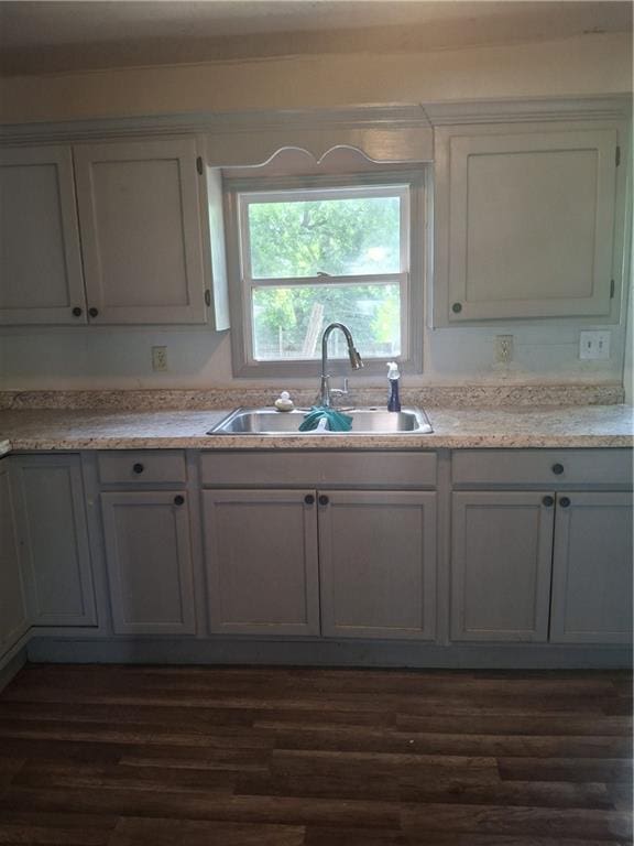 608 N Cedar St, Ottawa, KS 66067 - kitchen featuring dark wood-style floors and light countertops