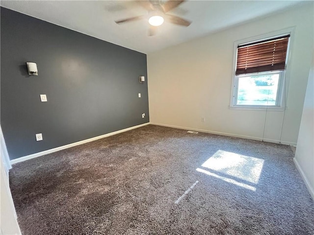 14948 Lakeside Dr, Excelsior Springs, MO 64024 - unfurnished room with a ceiling fan and carpet floors