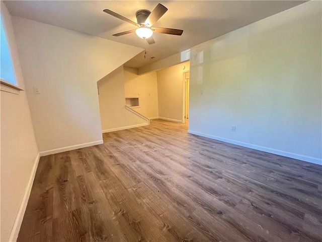 14948 Lakeside Dr, Excelsior Springs, MO 64024 - unfurnished living room with a ceiling fan and wood finished floors