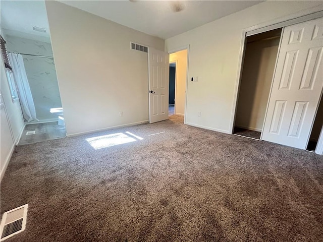 14948 Lakeside Dr, Excelsior Springs, MO 64024 - unfurnished bedroom with carpet flooring, a closet, and ensuite bathroom