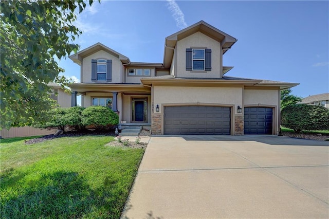 10963 S Carbondale St, Olathe, KS 66061 - view of front of house with stucco siding, a front lawn, and driveway