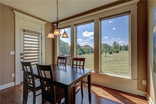 10963 S Carbondale St, Olathe, KS 66061 - dining room with dark wood-style floors