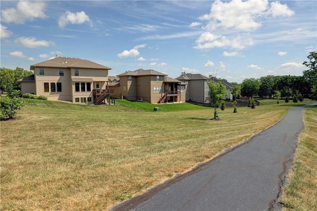 10963 S Carbondale St, Olathe, KS 66061 - view of grassy yard with stairway
