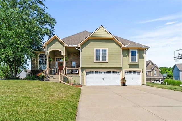 2312 SW Post Oak Ct, Lees Summit, MO 64082 - view of front of house featuring an attached garage, driveway, a front lawn, and covered porch