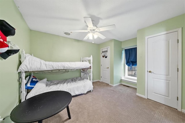 2312 SW Post Oak Ct, Lees Summit, MO 64082 - bedroom with carpet and ceiling fan