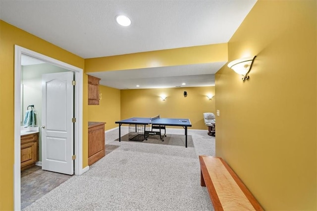 2312 SW Post Oak Ct, Lees Summit, MO 64082 - recreation room with light colored carpet and recessed lighting