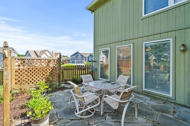 2312 SW Post Oak Ct, Lees Summit, MO 64082 - view of patio featuring outdoor dining area
