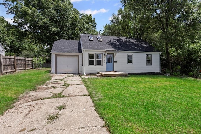 3029 S 9th Pl, Kansas City, KS 66103 - view of front facade featuring asphalt driveway, an attached garage, and roof with shingles