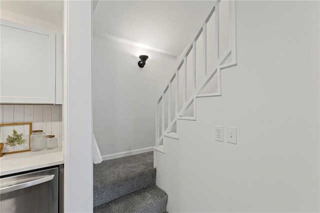 3029 S 9th Pl, Kansas City, KS 66103 - staircase featuring carpet and baseboards
