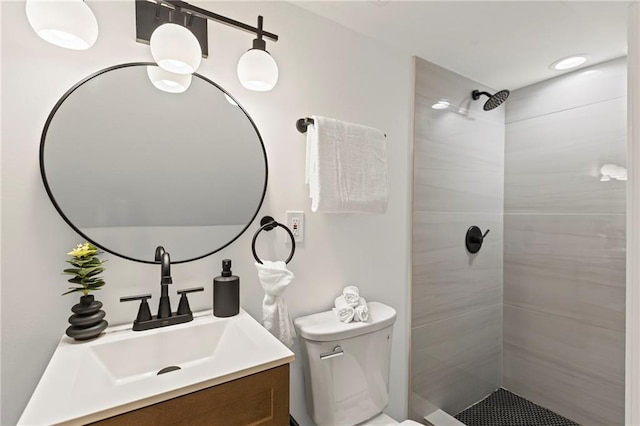 3029 S 9th Pl, Kansas City, KS 66103 - bathroom featuring vanity and tiled shower