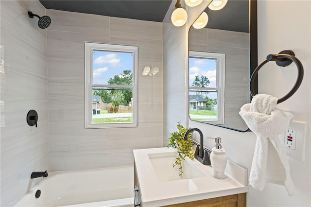 3029 S 9th Pl, Kansas City, KS 66103 - bathroom with vanity and shower / bathtub combination
