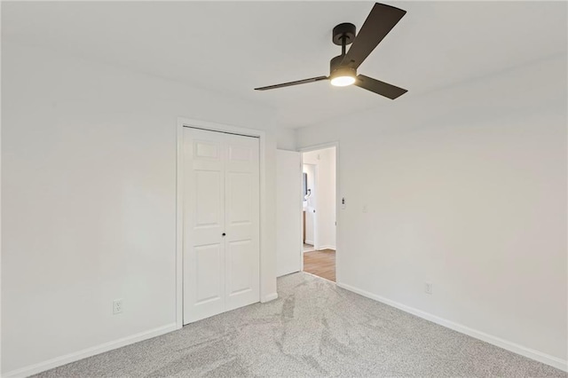 3029 S 9th Pl, Kansas City, KS 66103 - unfurnished bedroom with carpet flooring, a closet, and ceiling fan