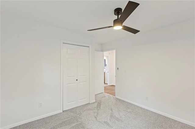 3029 S 9th Pl, Kansas City, KS 66103 - unfurnished bedroom featuring carpet floors, a closet, and ceiling fan
