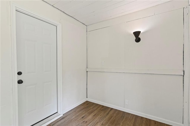 3029 S 9th Pl, Kansas City, KS 66103 - spare room featuring wood finished floors and baseboards
