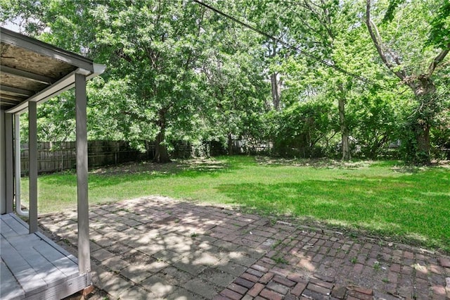 3029 S 9th Pl, Kansas City, KS 66103 - fenced backyard featuring a patio