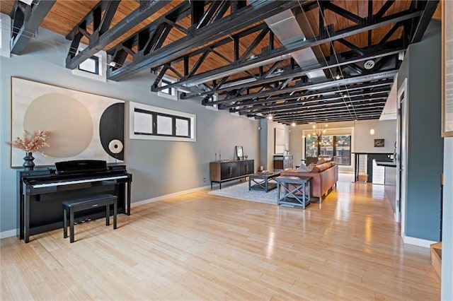 1303 W 47th St, Kansas City, MO 64112 - living area featuring wood finished floors