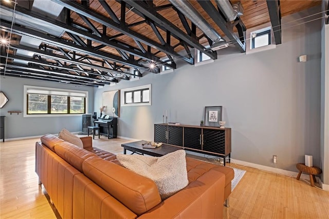 1303 W 47th St, Kansas City, MO 64112 - living area featuring wood finished floors and baseboards