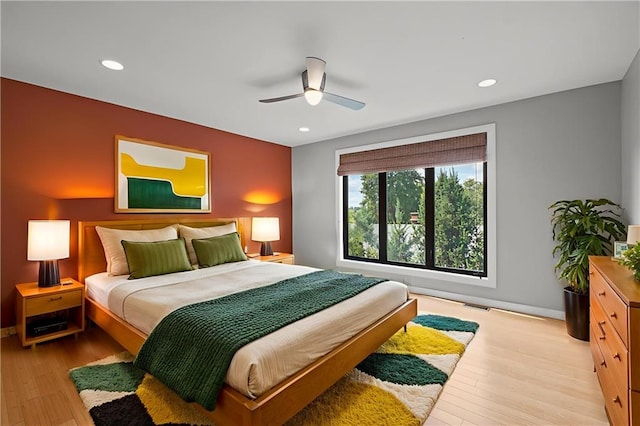 1303 W 47th St, Kansas City, MO 64112 - bedroom with recessed lighting, light wood-style floors, and ceiling fan