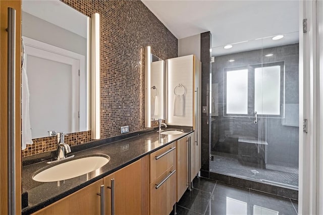 1303 W 47th St, Kansas City, MO 64112 - bathroom with double vanity, a stall shower, and granite floors