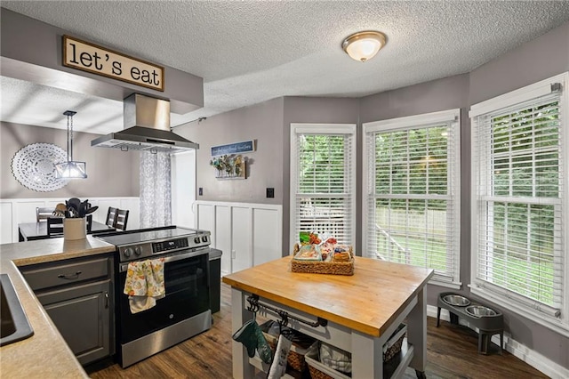 17507 E 35th Ter, Independence, MO 64055 - kitchen with electric stove, extractor fan, dark wood-style floors, plenty of natural light, and a textured ceiling