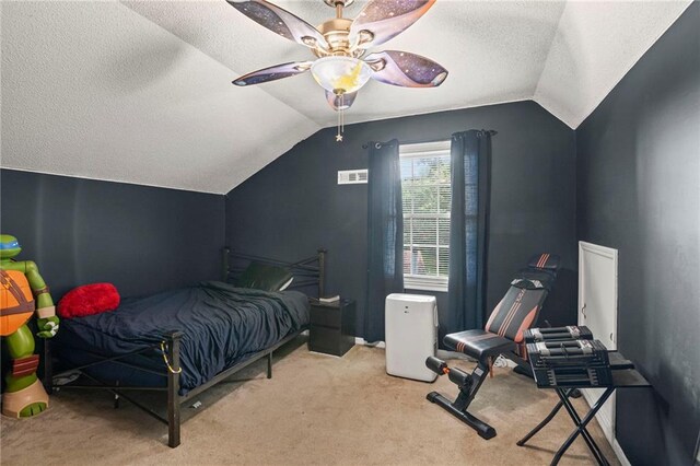 17507 E 35th Ter, Independence, MO 64055 - bedroom with lofted ceiling, carpet floors, a textured ceiling, and a ceiling fan