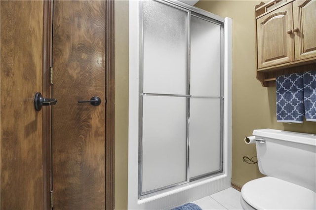 2005 NW Fawn Dr, Blue Springs, MO 64015 - bathroom featuring a shower stall and tile patterned floors