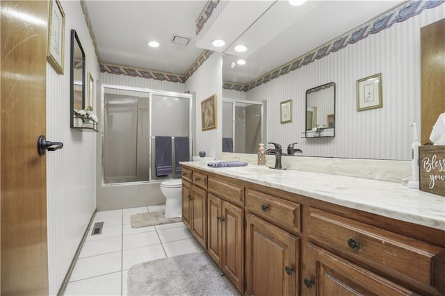 2005 NW Fawn Dr, Blue Springs, MO 64015 - bathroom with vanity, tile patterned floors, shower / bath combination with glass door, and wallpapered walls