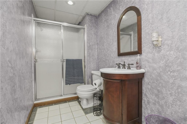 2005 NW Fawn Dr, Blue Springs, MO 64015 - bathroom with tile patterned floors, a shower stall, and vanity