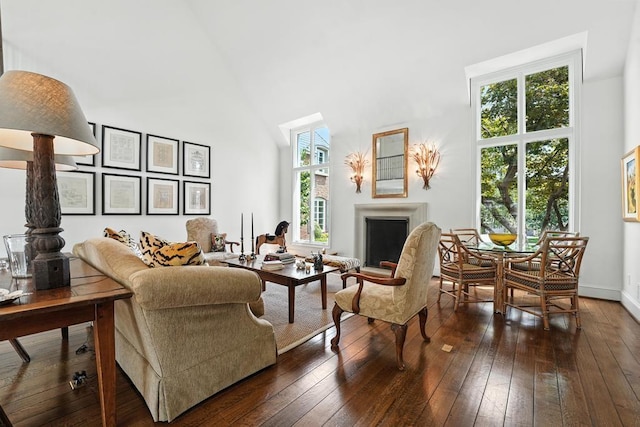 28 Le Mans Ct, Prairie Village, KS 66208 - living room featuring a high ceiling, dark wood-style floors, and a fireplace