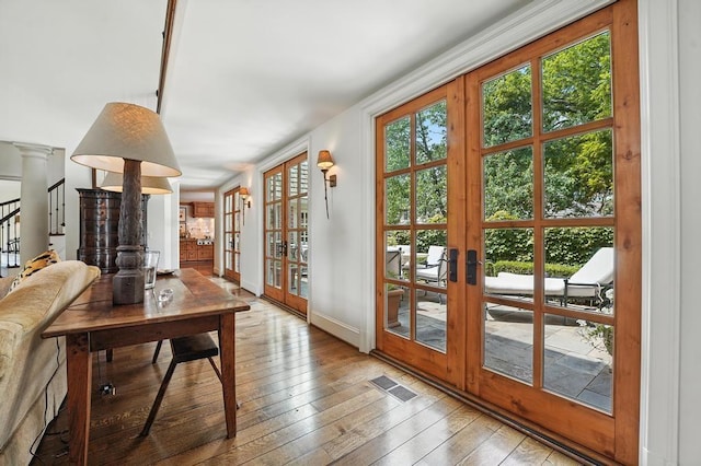 28 Le Mans Ct, Prairie Village, KS 66208 - doorway with french doors, wood-type flooring, and stairway