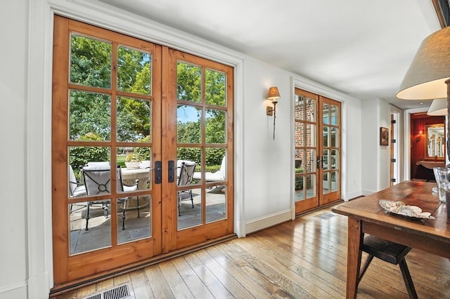 28 Le Mans Ct, Prairie Village, KS 66208 - doorway to outside featuring french doors and hardwood / wood-style flooring