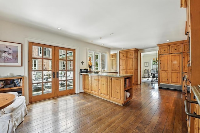 28 Le Mans Ct, Prairie Village, KS 66208 - kitchen featuring french doors, a peninsula, dark wood-type flooring, recessed lighting, and open shelves