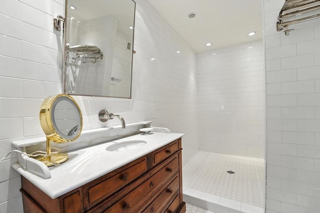 28 Le Mans Ct, Prairie Village, KS 66208 - full bathroom featuring tile walls, vanity, a tile shower, and recessed lighting