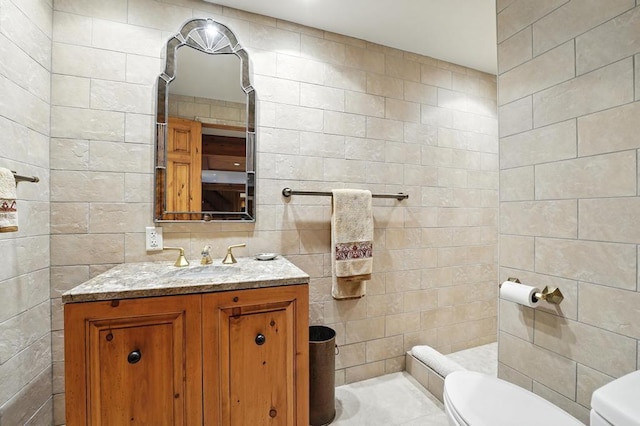 28 Le Mans Ct, Prairie Village, KS 66208 - bathroom with vanity, tile walls, and tiled shower