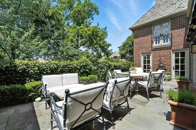 28 Le Mans Ct, Prairie Village, KS 66208 - view of patio with an outdoor hangout area and outdoor dining area