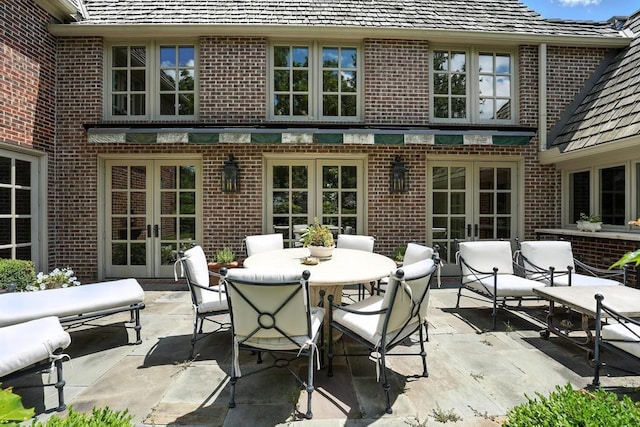28 Le Mans Ct, Prairie Village, KS 66208 - view of patio with french doors and outdoor dining area
