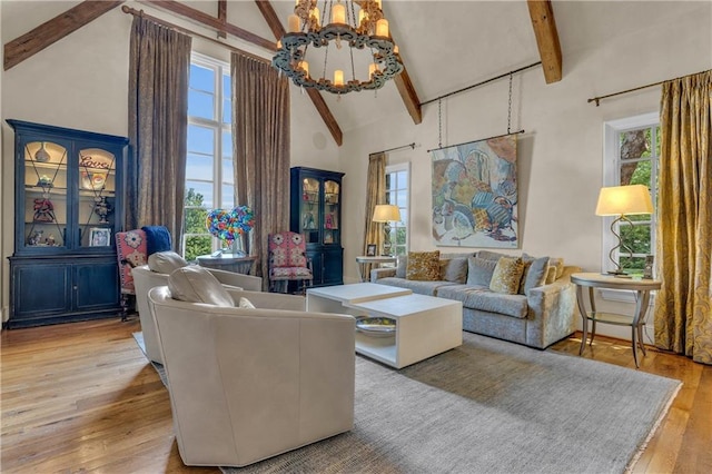 10400 Howe Dr, Leawood, KS 66206 - living room with high vaulted ceiling, beam ceiling, a chandelier, and hardwood / wood-style flooring