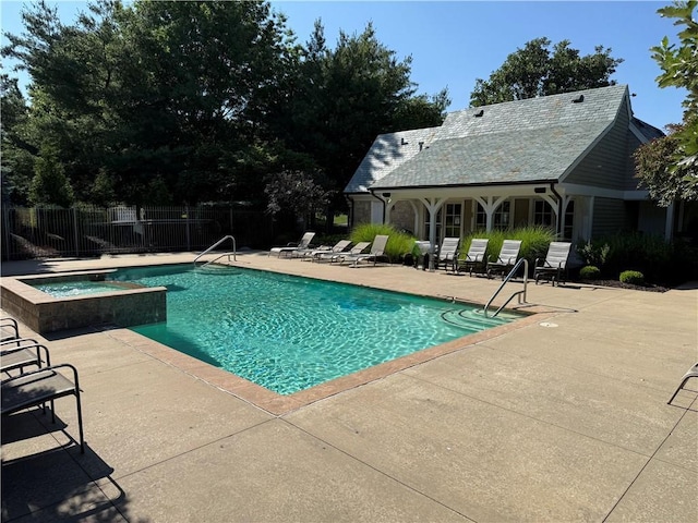 10400 Howe Dr, Leawood, KS 66206 - view of swimming pool with a patio area and a pool with connected hot tub