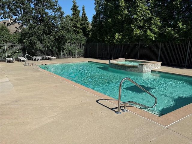 10400 Howe Dr, Leawood, KS 66206 - view of pool with a pool with connected hot tub and a patio area