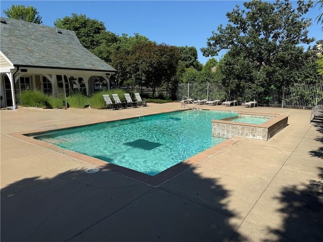 10400 Howe Dr, Leawood, KS 66206 - view of pool featuring a patio area and a pool with connected hot tub