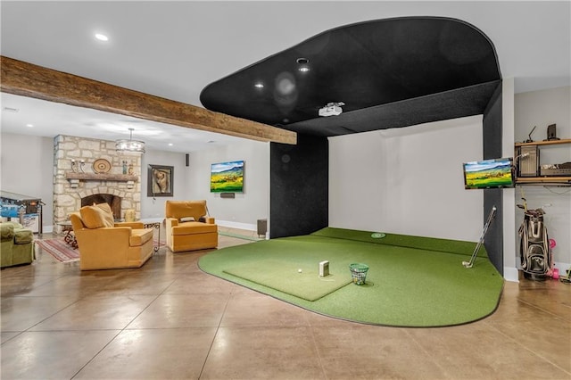 10400 Howe Dr, Leawood, KS 66206 - recreation room with beam ceiling, recessed lighting, golf simulator, and a stone fireplace