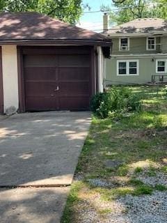 809 W Gregory Blvd, Kansas City, MO 64114 - garage with concrete driveway